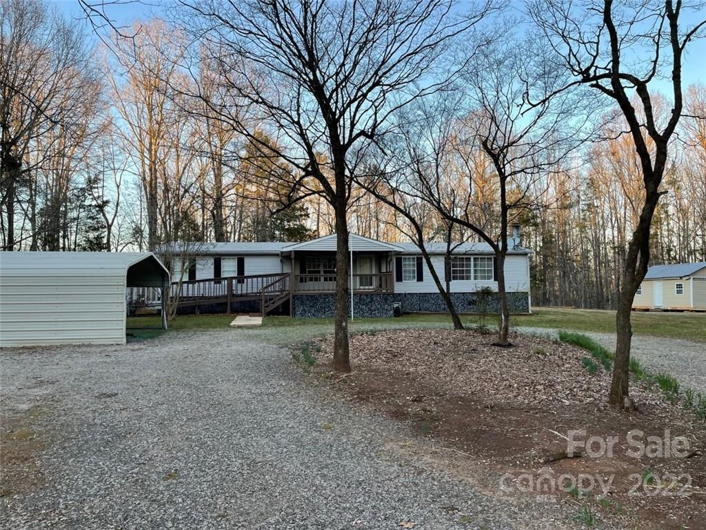 247 Tirzah Church Road, Unit 3 Lancaster, SC 29720 - Photo 5 of 31 a view of a house with a backyard