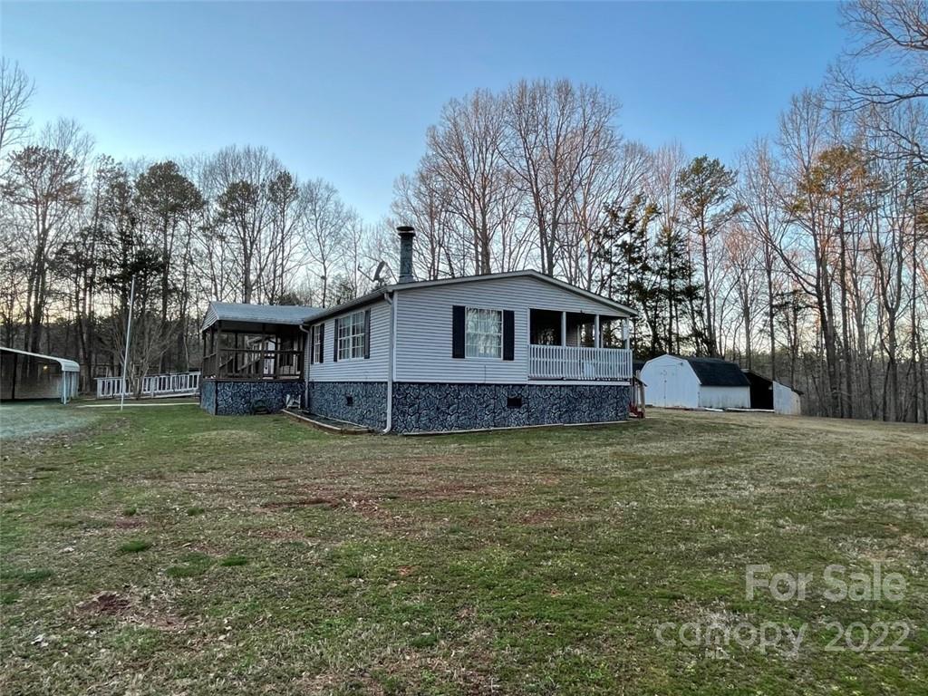 247 Tirzah Church Road, Unit 3 Lancaster, SC 29720 - Photo 7 of 31 a house view with a garden space