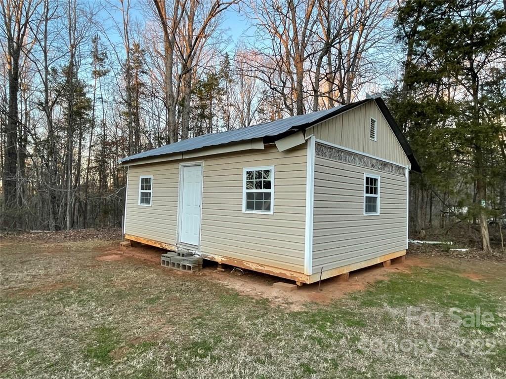 247 Tirzah Church Road, Unit 3 Lancaster, SC 29720 - Photo 8 of 31 a view of a house with a yard