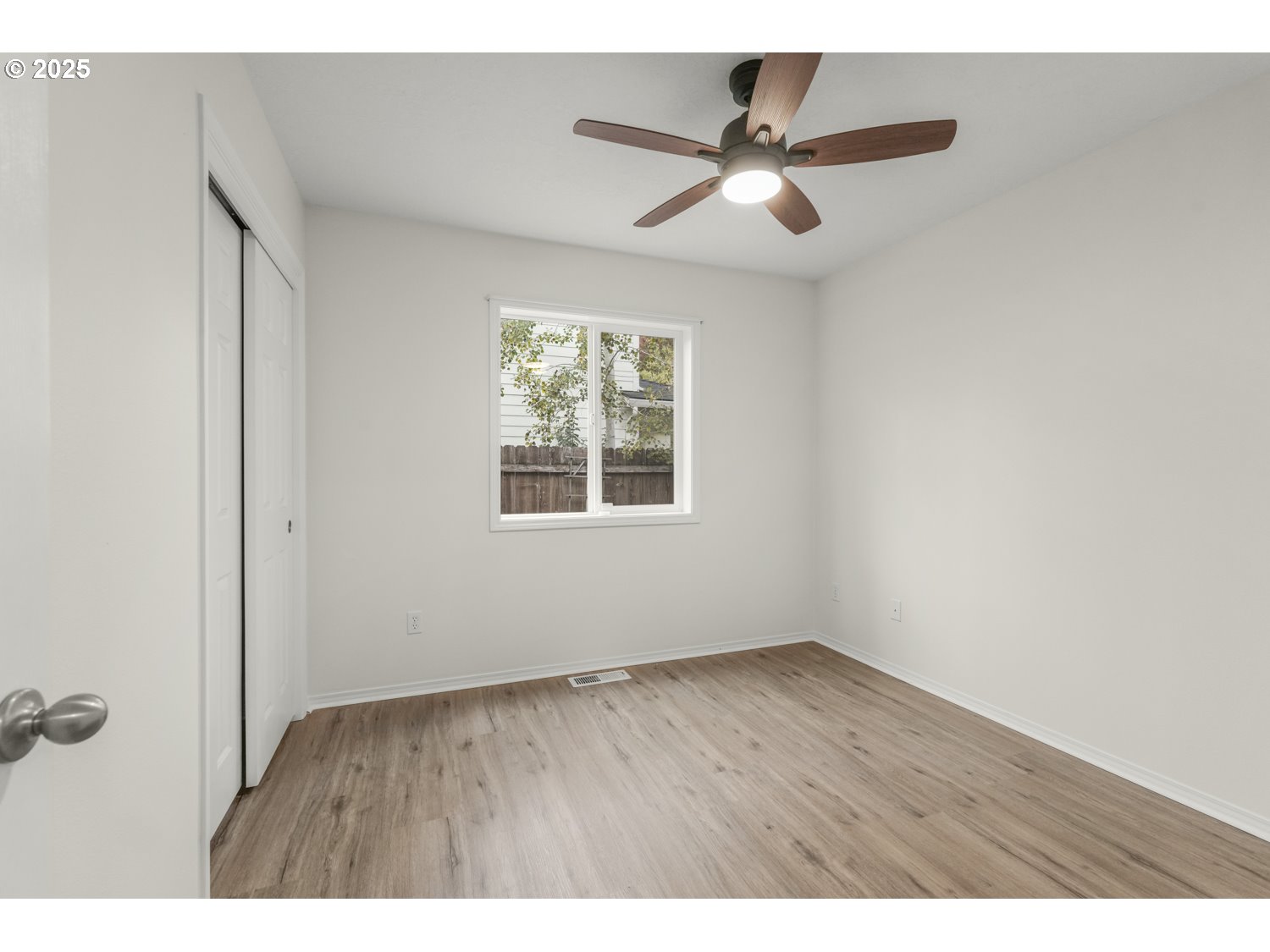 1930 Salmon Run Southwest Albany, OR 97321 - Photo 17 of 26 a view of an empty room with a window