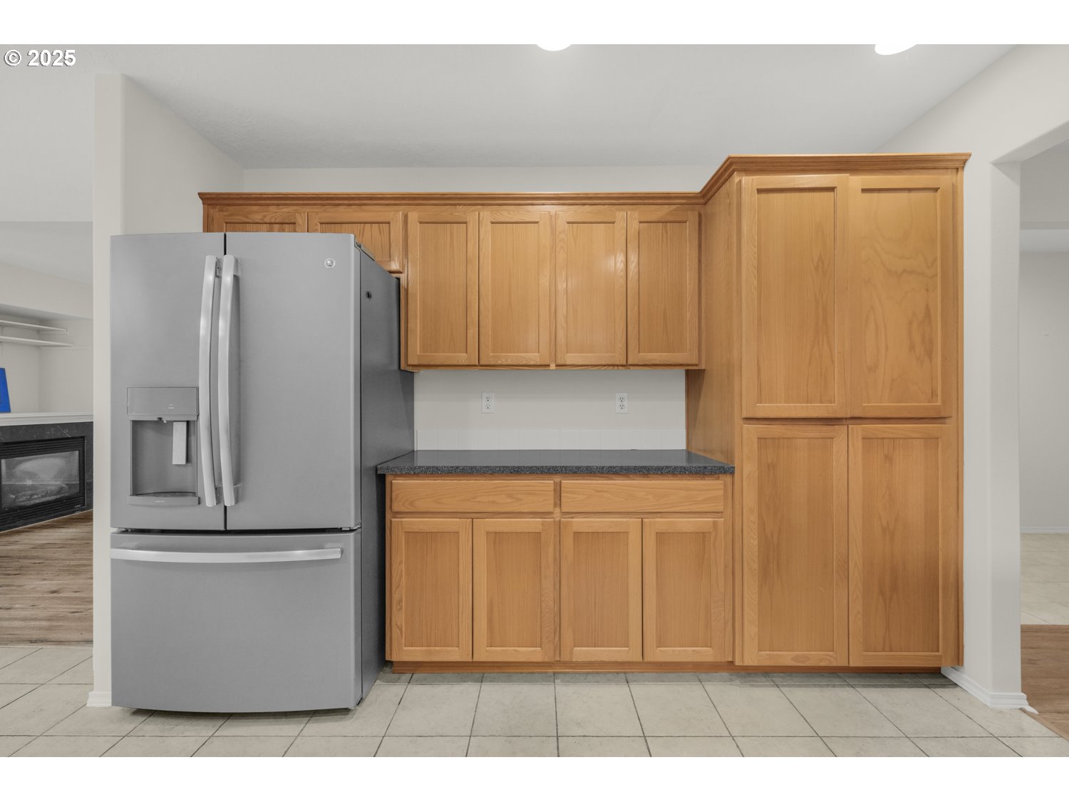 1930 Salmon Run Southwest Albany, OR 97321 - Photo 6 of 26 a kitchen with stainless steel appliances a refrigerator and cabinets