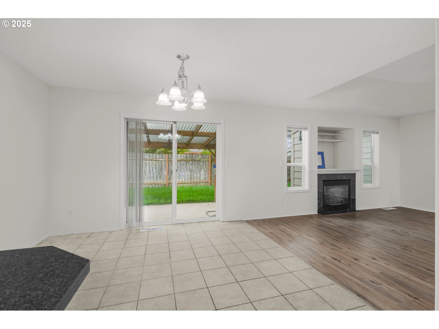 1930 Salmon Run Southwest Albany, OR 97321 - Photo 10 of 26 a view of an empty room with a kitchen