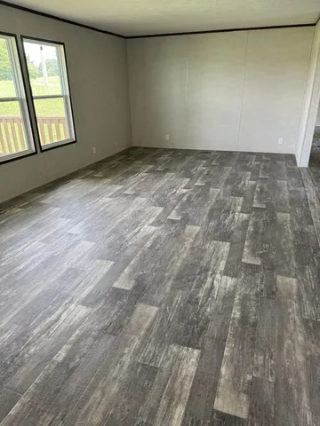 an empty room with windows