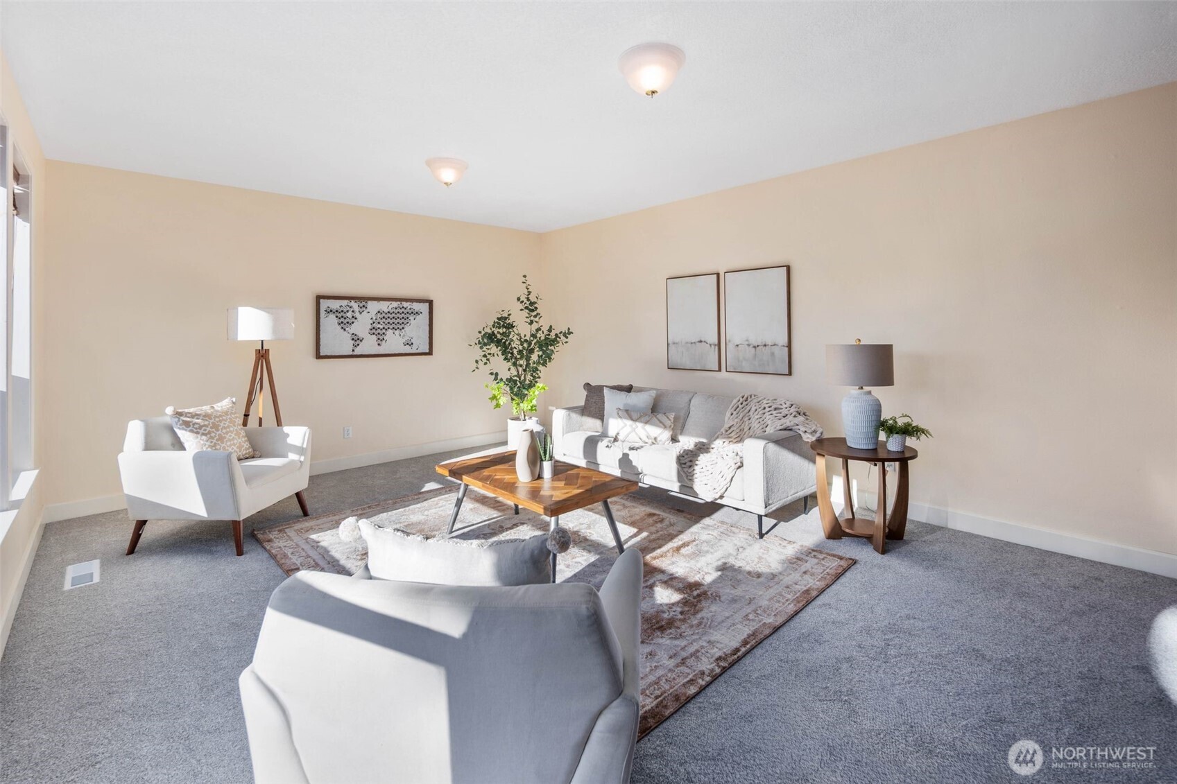 16104 Northeast 6th Court Ridgefield, WA 98642 - Photo 11 of 40 a living room with furniture and a wooden floor