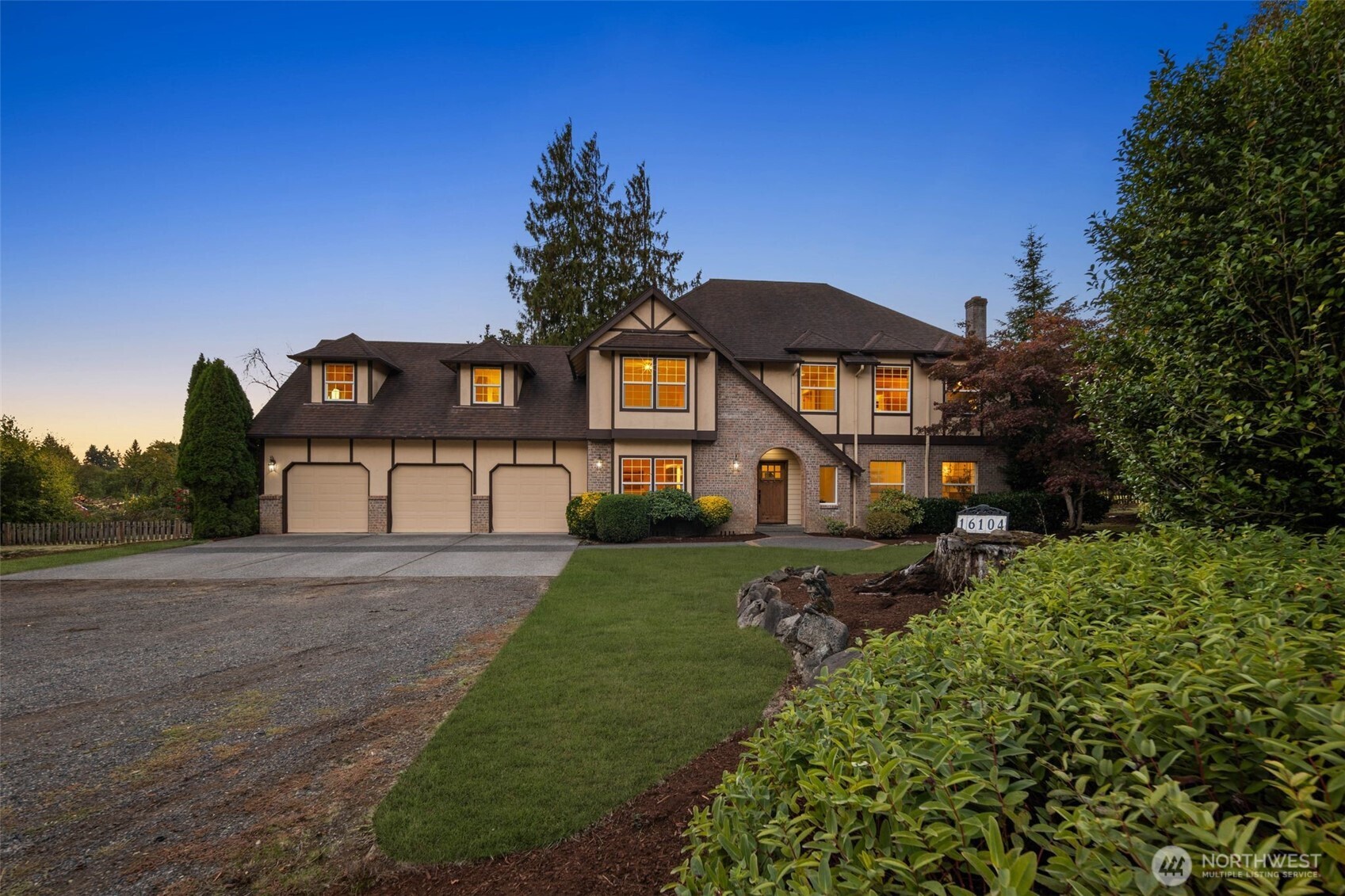 16104 Northeast 6th Court Ridgefield, WA 98642 - Photo 2 of 40 a front view of a house with a yard