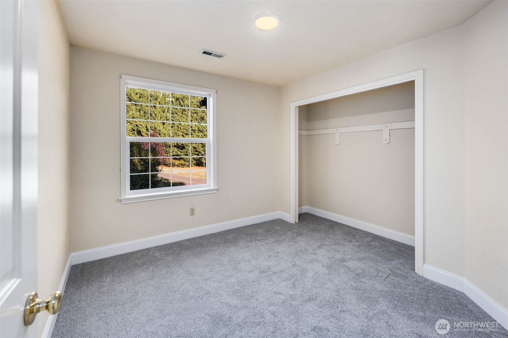 16104 Northeast 6th Court Ridgefield, WA 98642 - Photo 21 of 40 an empty room with windows