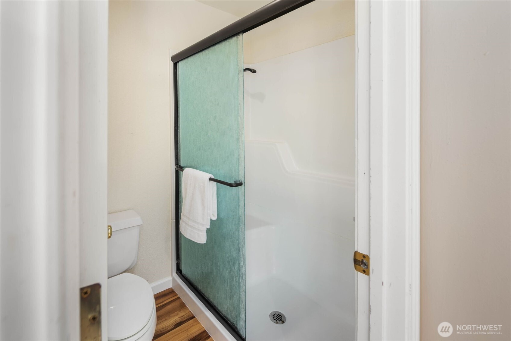 16104 Northeast 6th Court Ridgefield, WA 98642 - Photo 27 of 40 a bathroom with a toilet and a shower