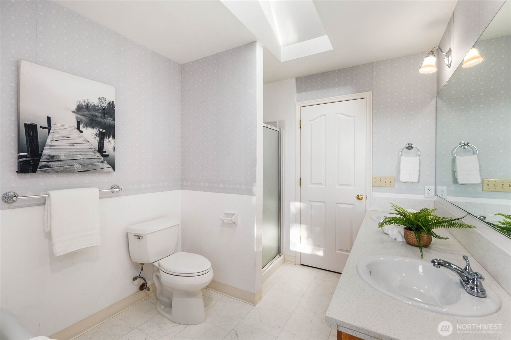 16104 Northeast 6th Court Ridgefield, WA 98642 - Photo 32 of 40 a bathroom with a sink toilet and shower