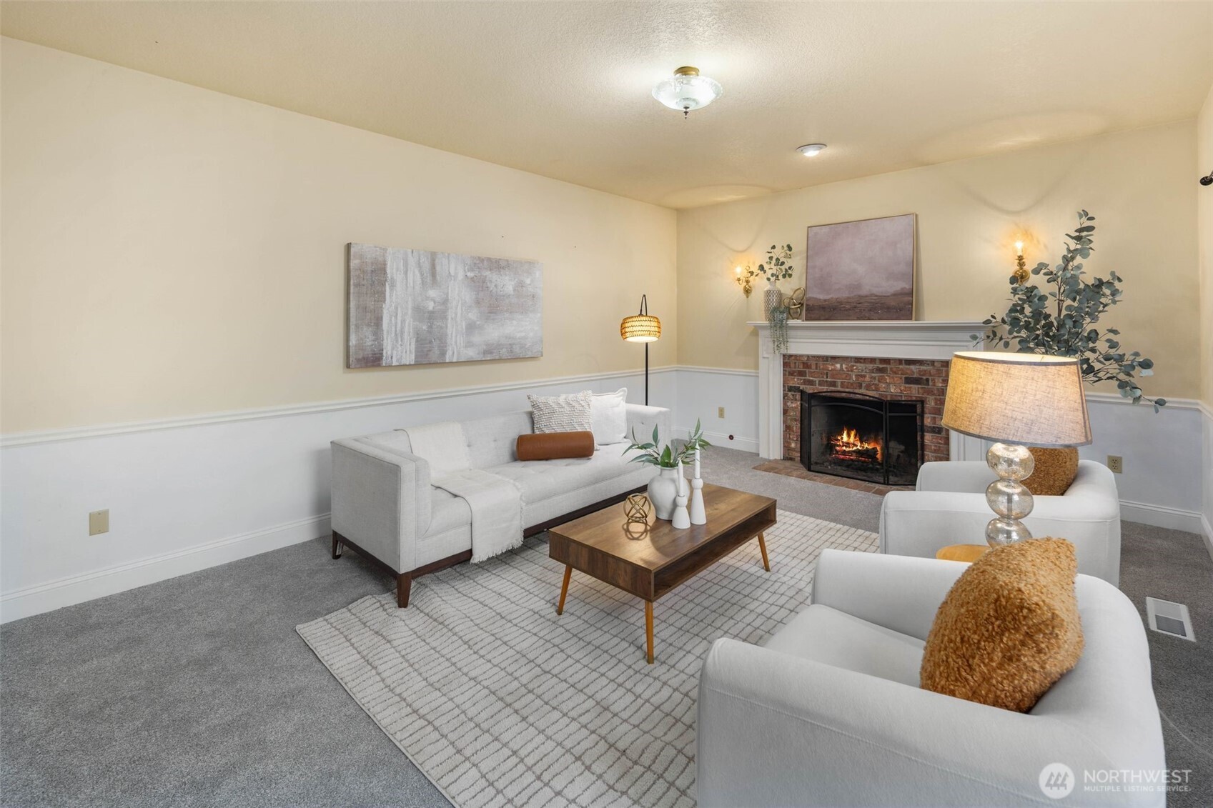 16104 Northeast 6th Court Ridgefield, WA 98642 - Photo 7 of 40 a living room with furniture and a fireplace