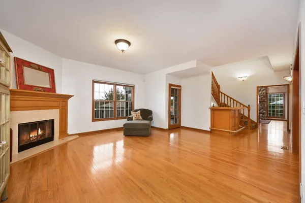 a view of a livingroom with furniture a fireplace