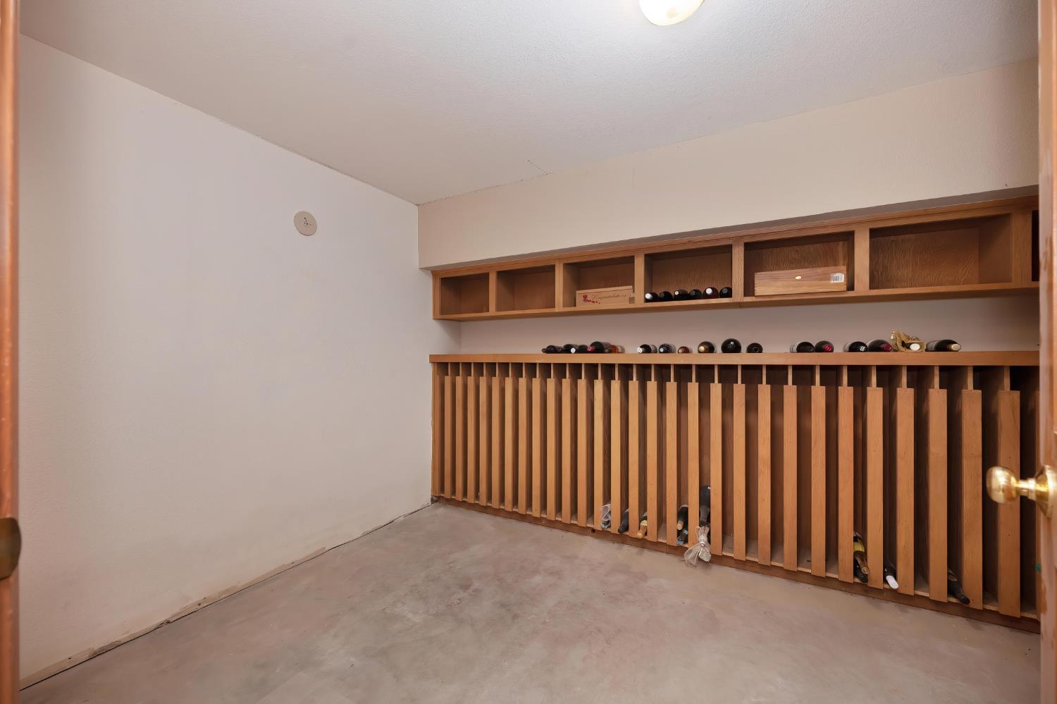 6408 Puerto Drive Rancho Murieta, CA 95683 - Photo 38 of 49 500 bottle wine cellar.