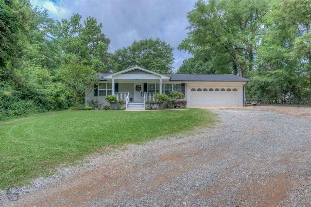 701 Chandler Road Haughton, LA 71037 - Photo 21 of 25 a view of a house with a yard and large tree