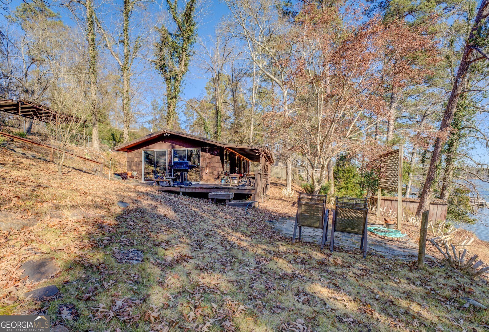 126 Shannon Way Jackson, GA 30233 - Photo 18 of 36 a view of house with outdoor space and sitting area