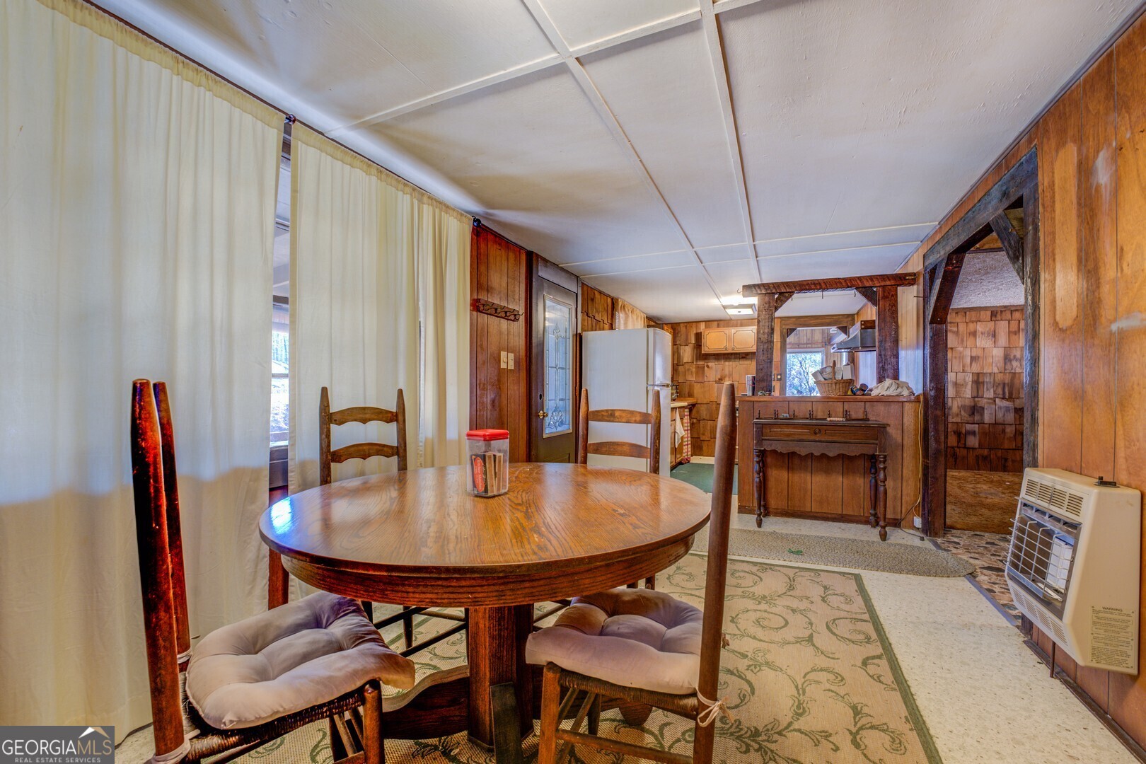 126 Shannon Way Jackson, GA 30233 - Photo 22 of 36 a outdoor dining space with furniture and a rug