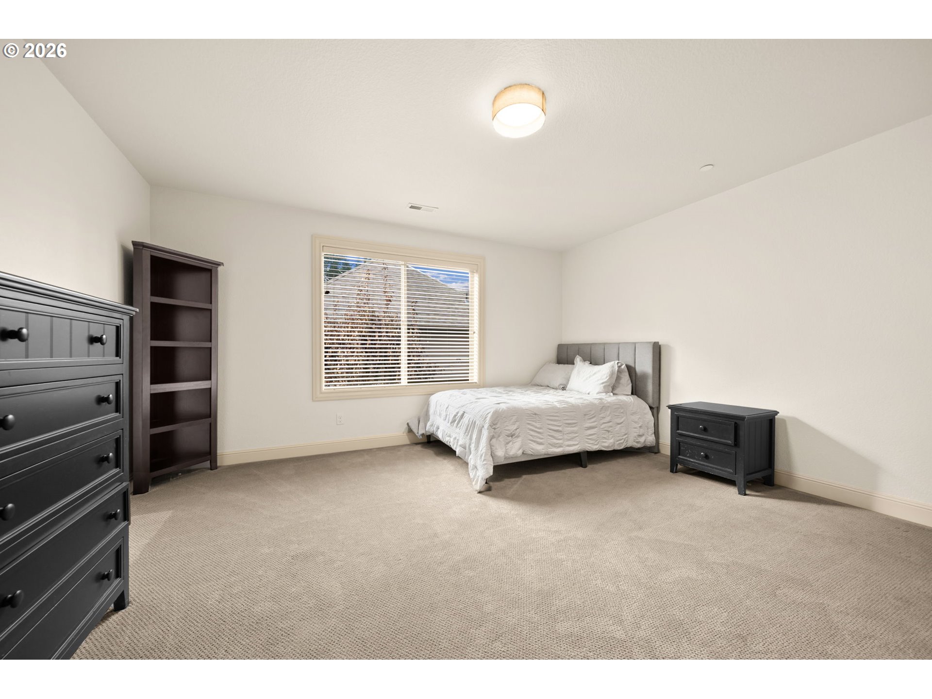 1406 Northwest 44th Avenue Camas, WA 98607 - Photo 26 of 48 a bedroom with a bed and a window