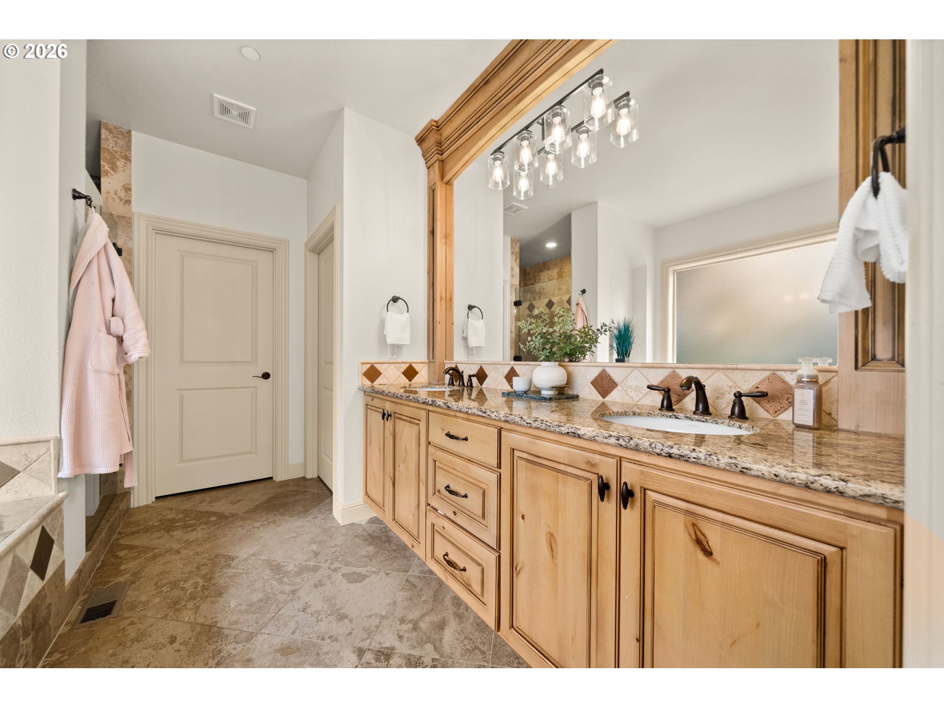 1406 Northwest 44th Avenue Camas, WA 98607 - Photo 29 of 48 a bathroom with a sink vanity granite tub shower and a mirror
