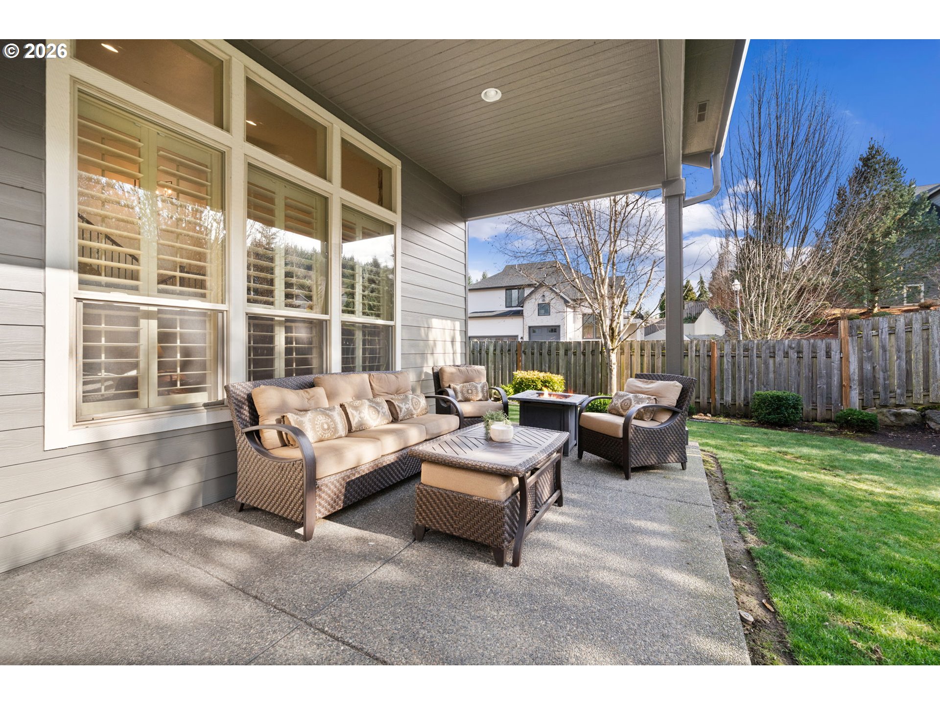 1406 Northwest 44th Avenue Camas, WA 98607 - Photo 38 of 48 a living room with furniture and a yard with wooden fence