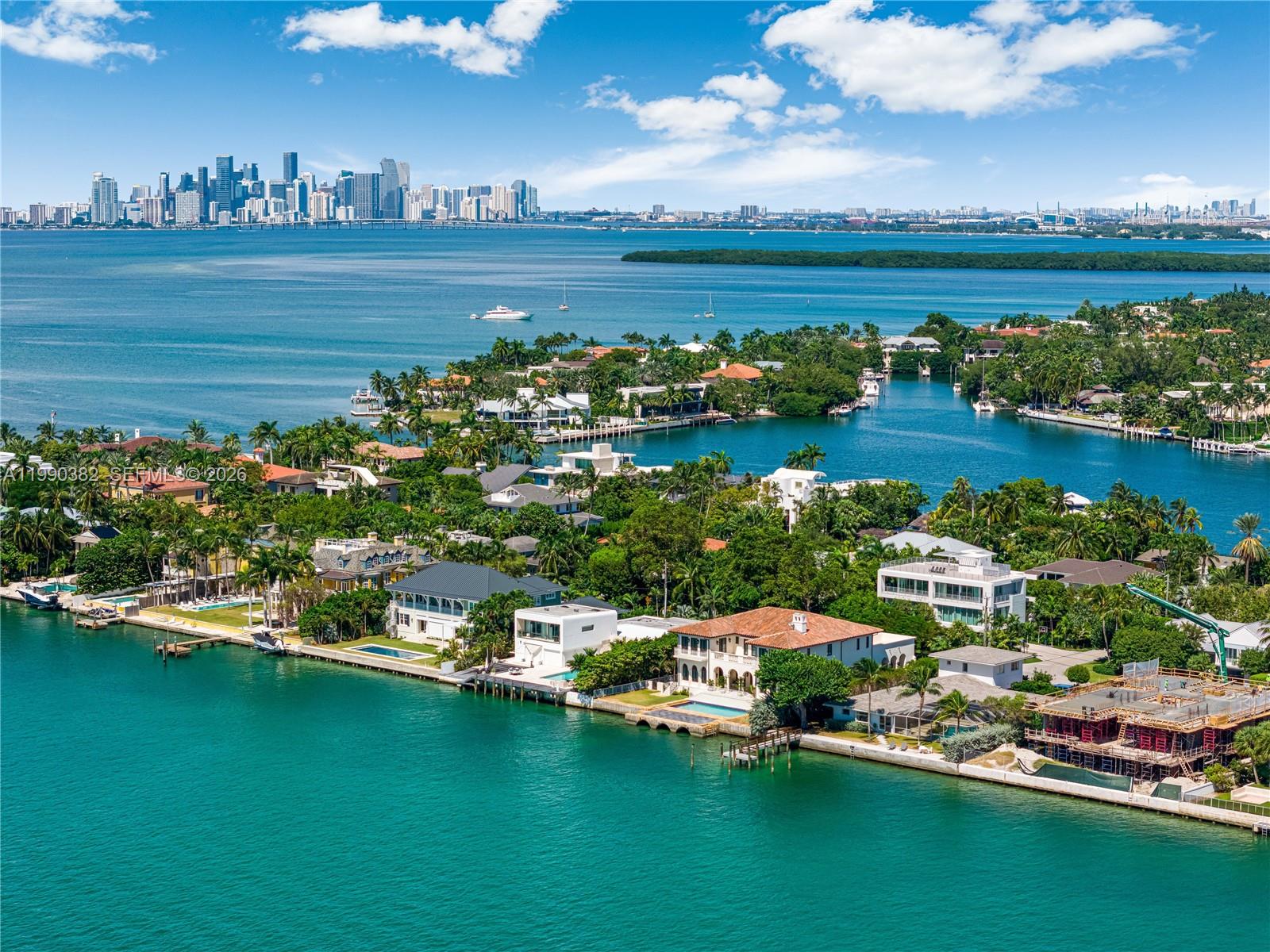 640 South Mashta Drive Key Biscayne, FL 33149 - Photo 3 of 38 a view of a city with lawn chairs