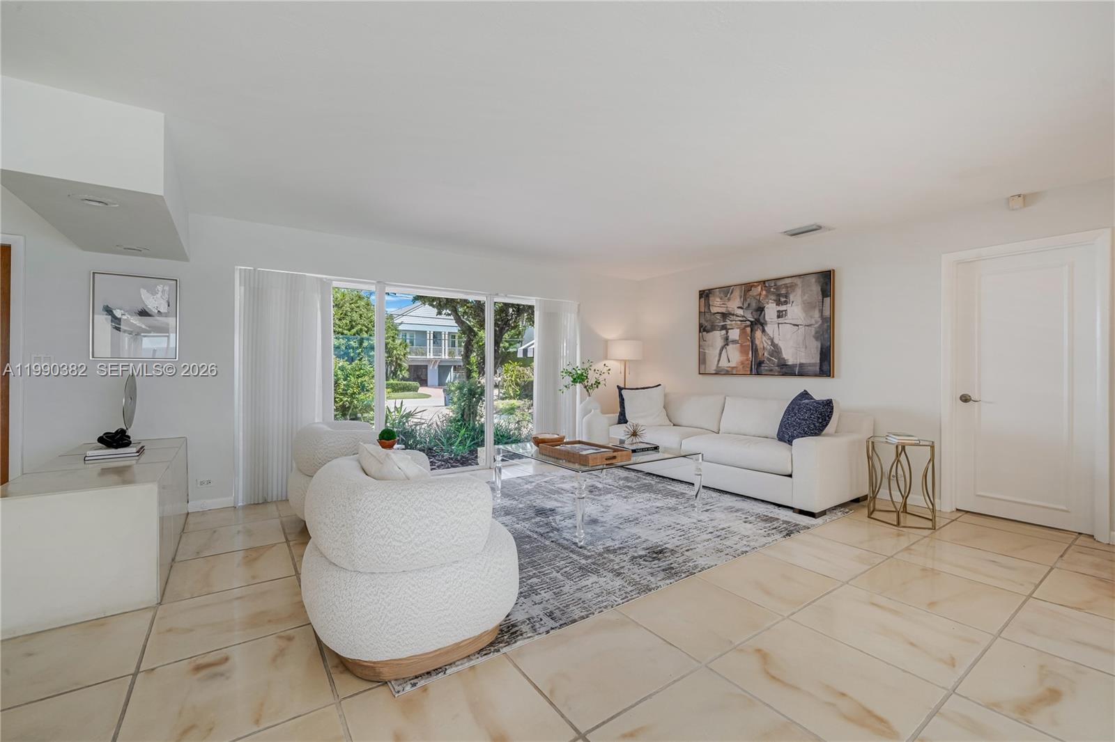 640 South Mashta Drive Key Biscayne, FL 33149 - Photo 38 of 38 a living room with furniture and a large window