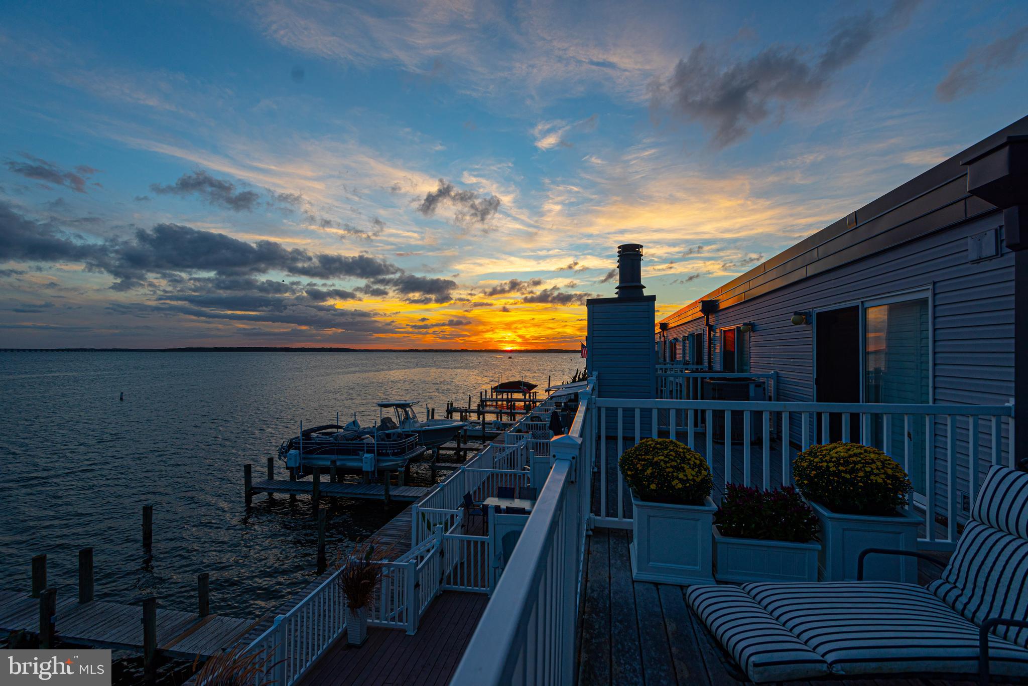 719 Rusty Anchor Road, Unit 5A Ocean City, MD 21842 - Photo 10 of 14 Sunset View off of Primary Bedroom Balcony.