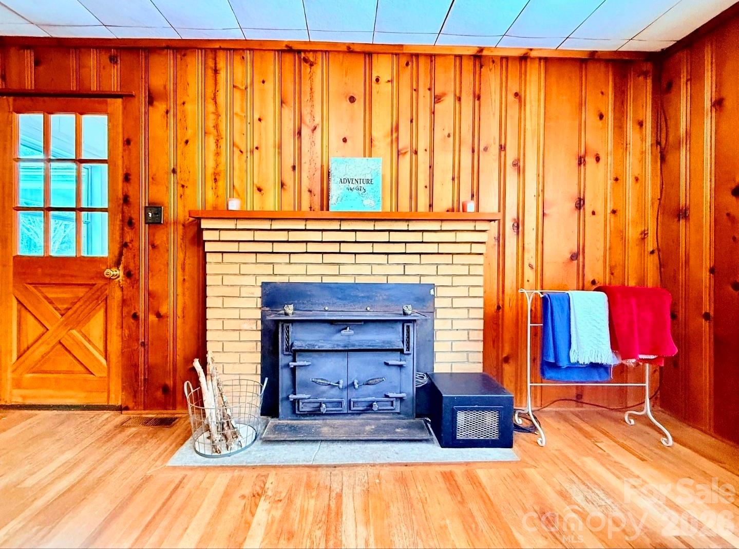 109 Wall Road Tryon, NC 28782 - Photo 23 of 30 a living room with a bed and next to a window