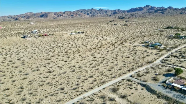 a view of houses and a mountain view