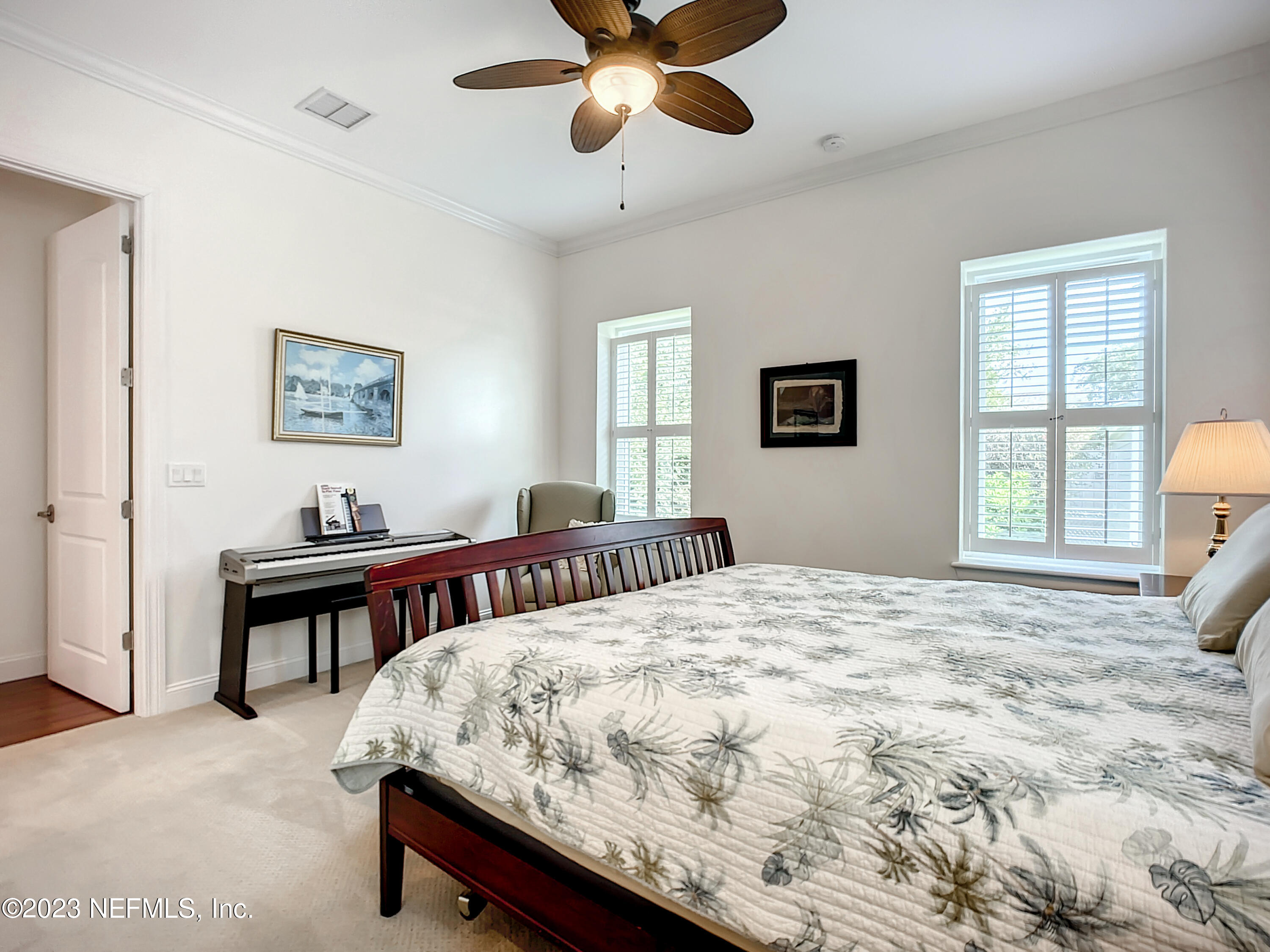 5356 2nd Street St. Augustine, FL 32080 - Photo 24 of 60 a bedroom with a bed and a window