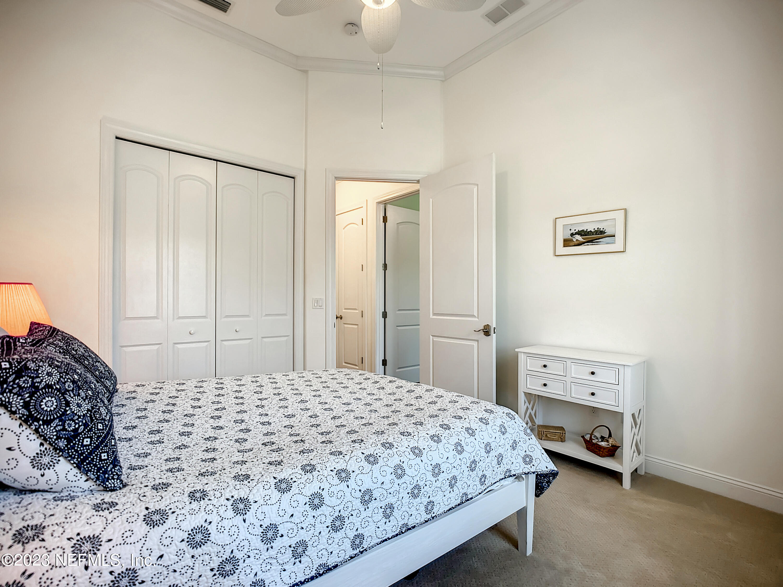 5356 2nd Street St. Augustine, FL 32080 - Photo 33 of 60 a bedroom with a bed and a window