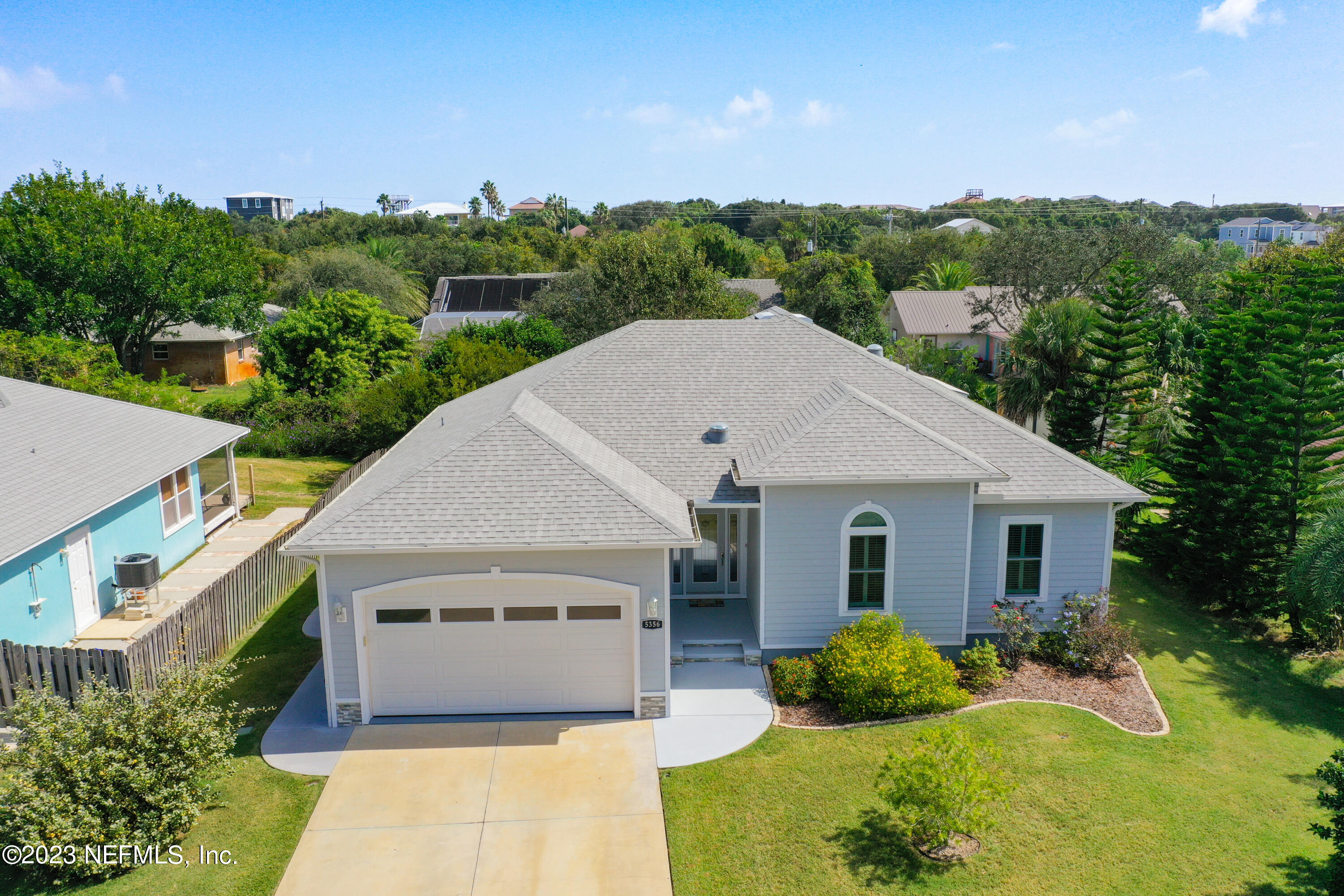 5356 2nd Street St. Augustine, FL 32080 - Photo 4 of 60 a aerial view of a house with yard and green space