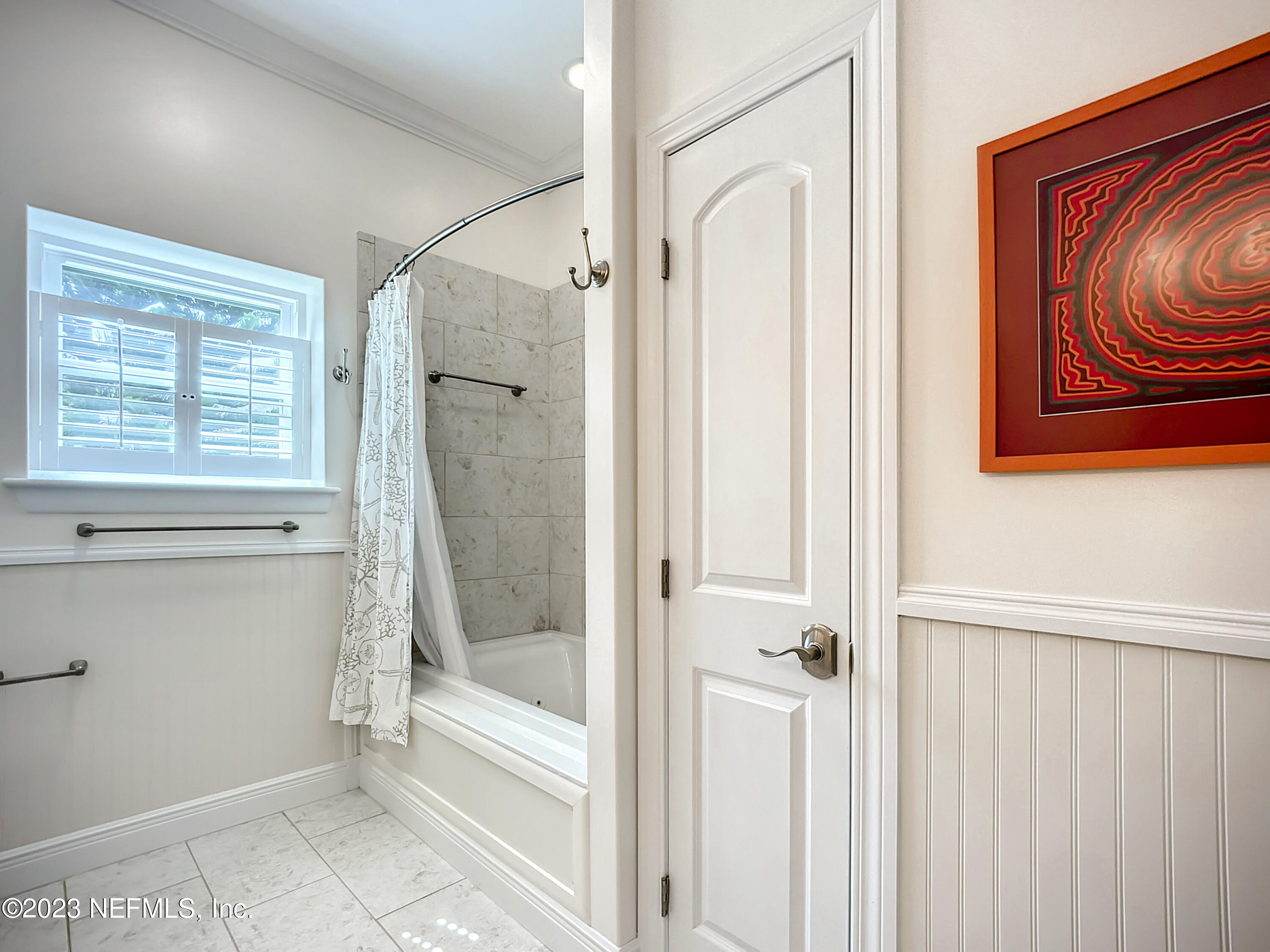 5356 2nd Street St. Augustine, FL 32080 - Photo 41 of 60 a bathroom with a shower and a sink