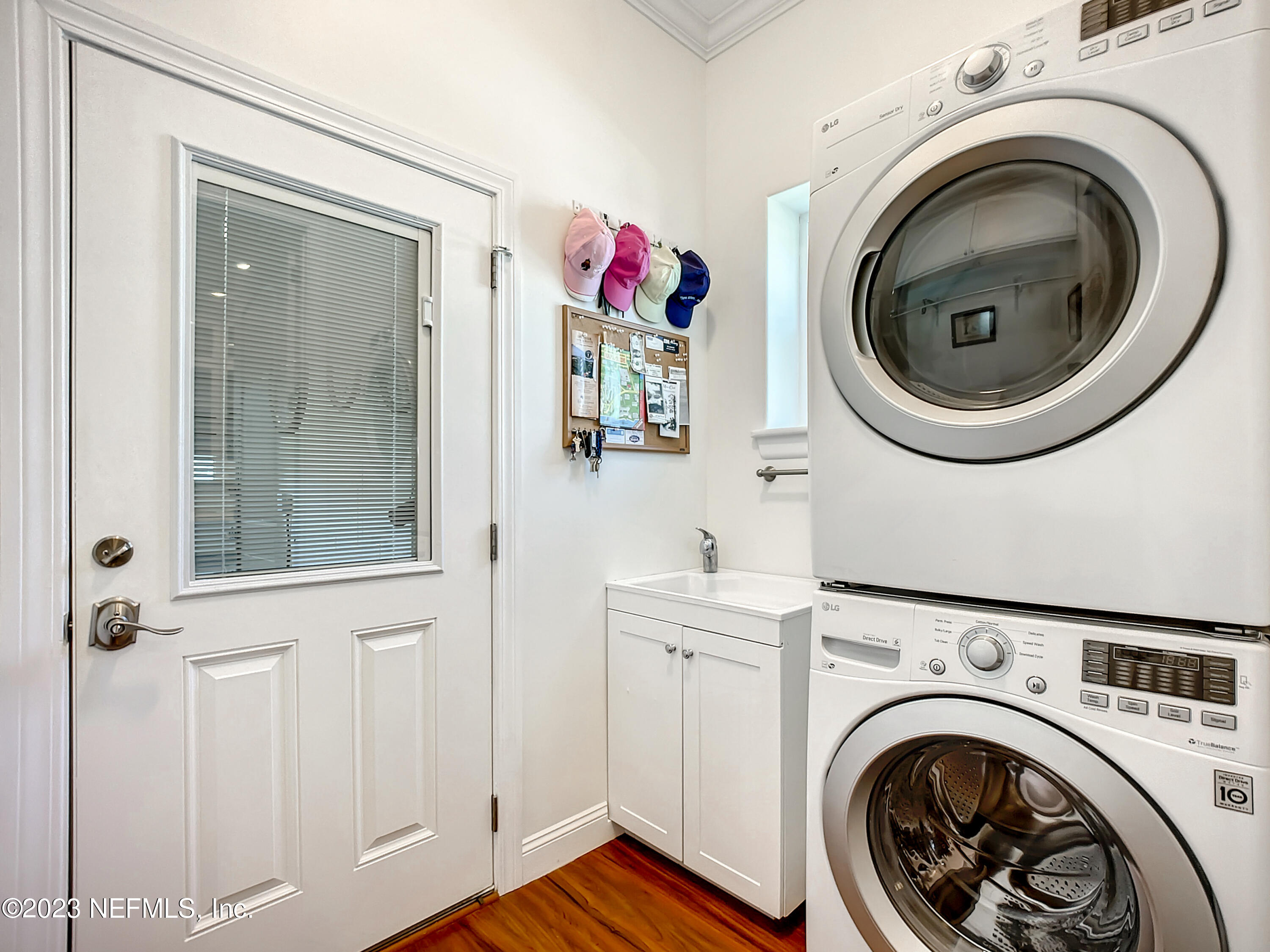 5356 2nd Street St. Augustine, FL 32080 - Photo 44 of 60 a view of a hallway with washer and dryer