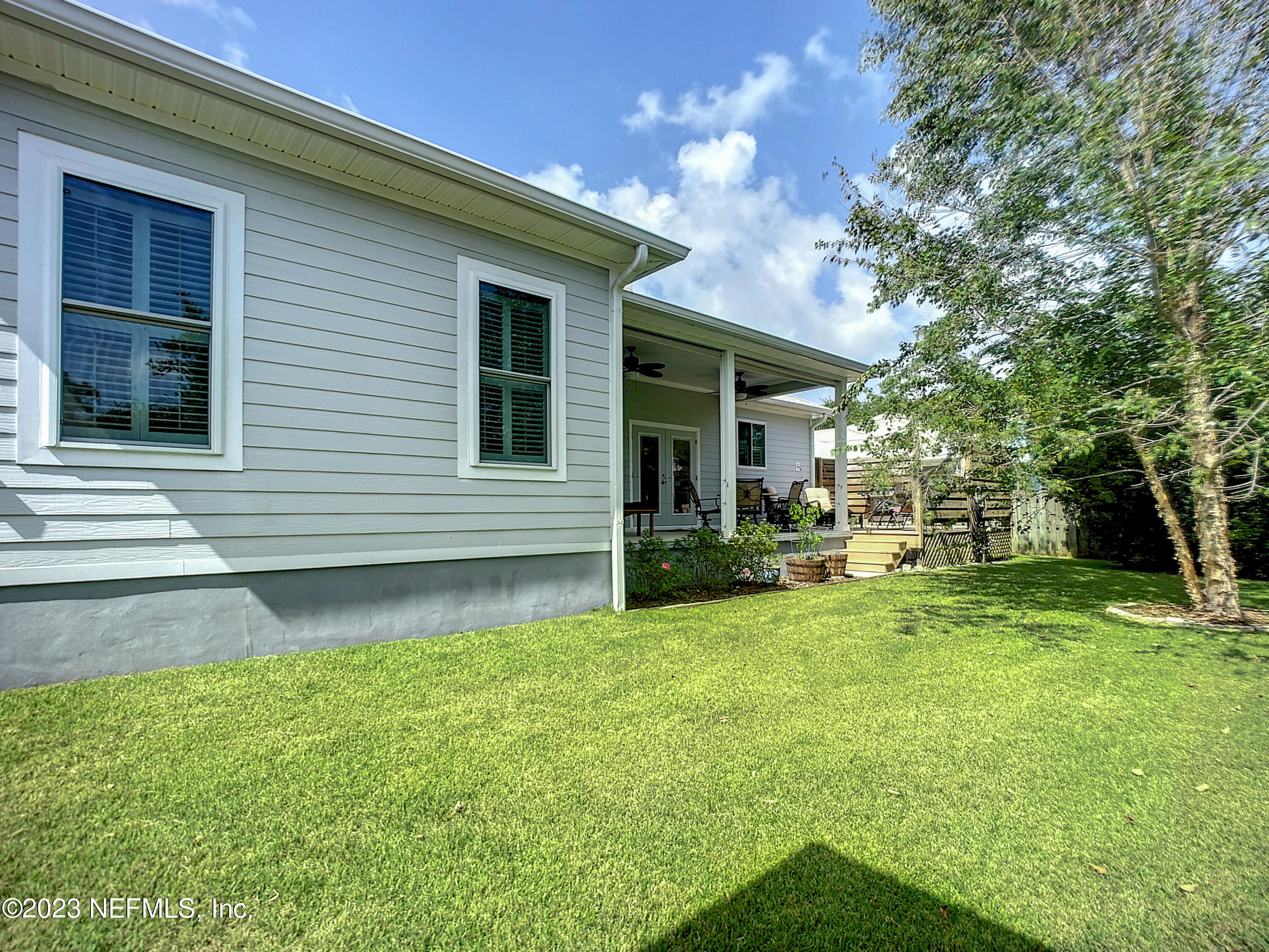5356 2nd Street St. Augustine, FL 32080 - Photo 52 of 60 a view of a house with a yard