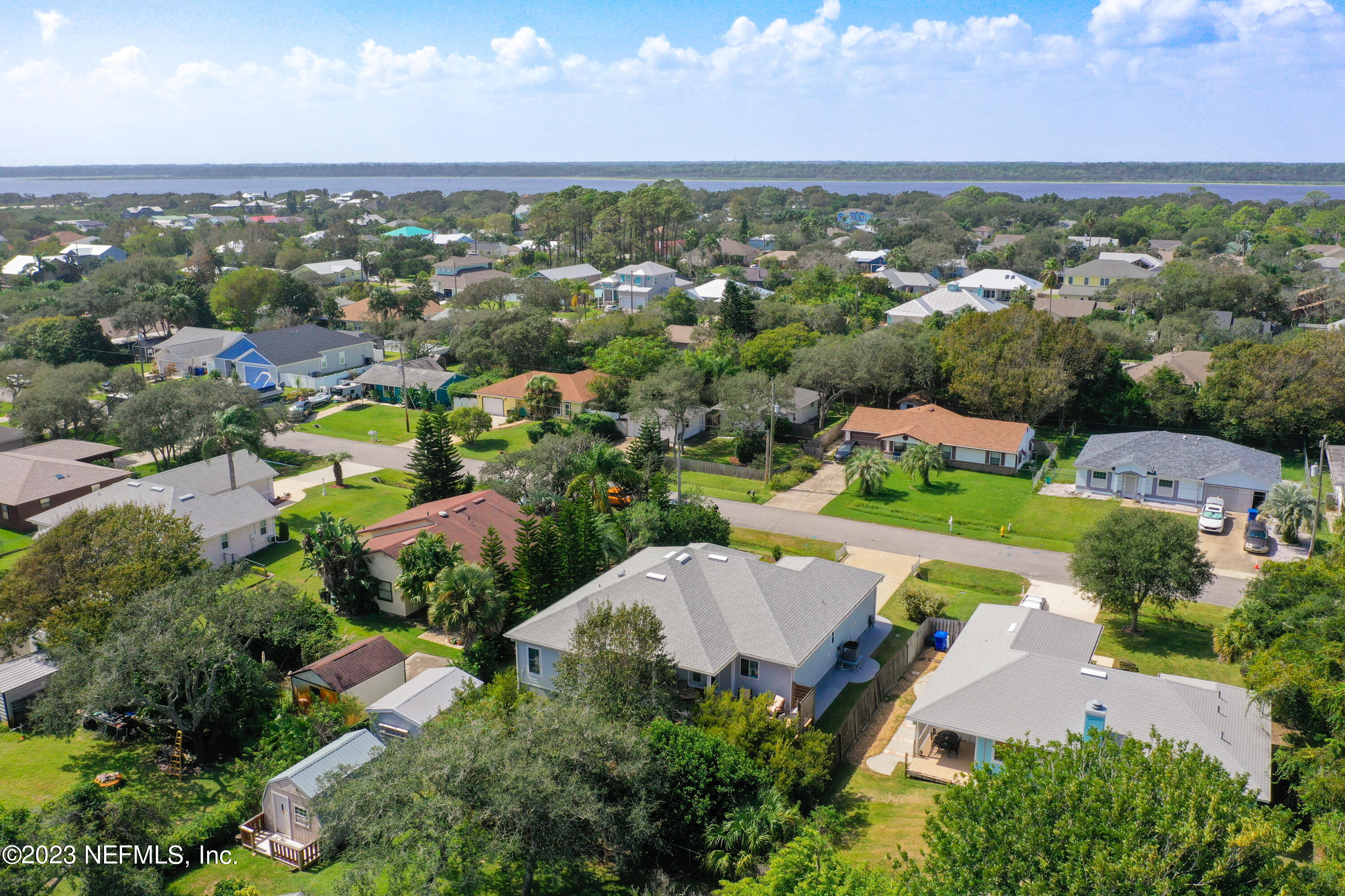 5356 2nd Street St. Augustine, FL 32080 - Photo 60 of 60 an aerial view of residential houses with outdoor space and trees