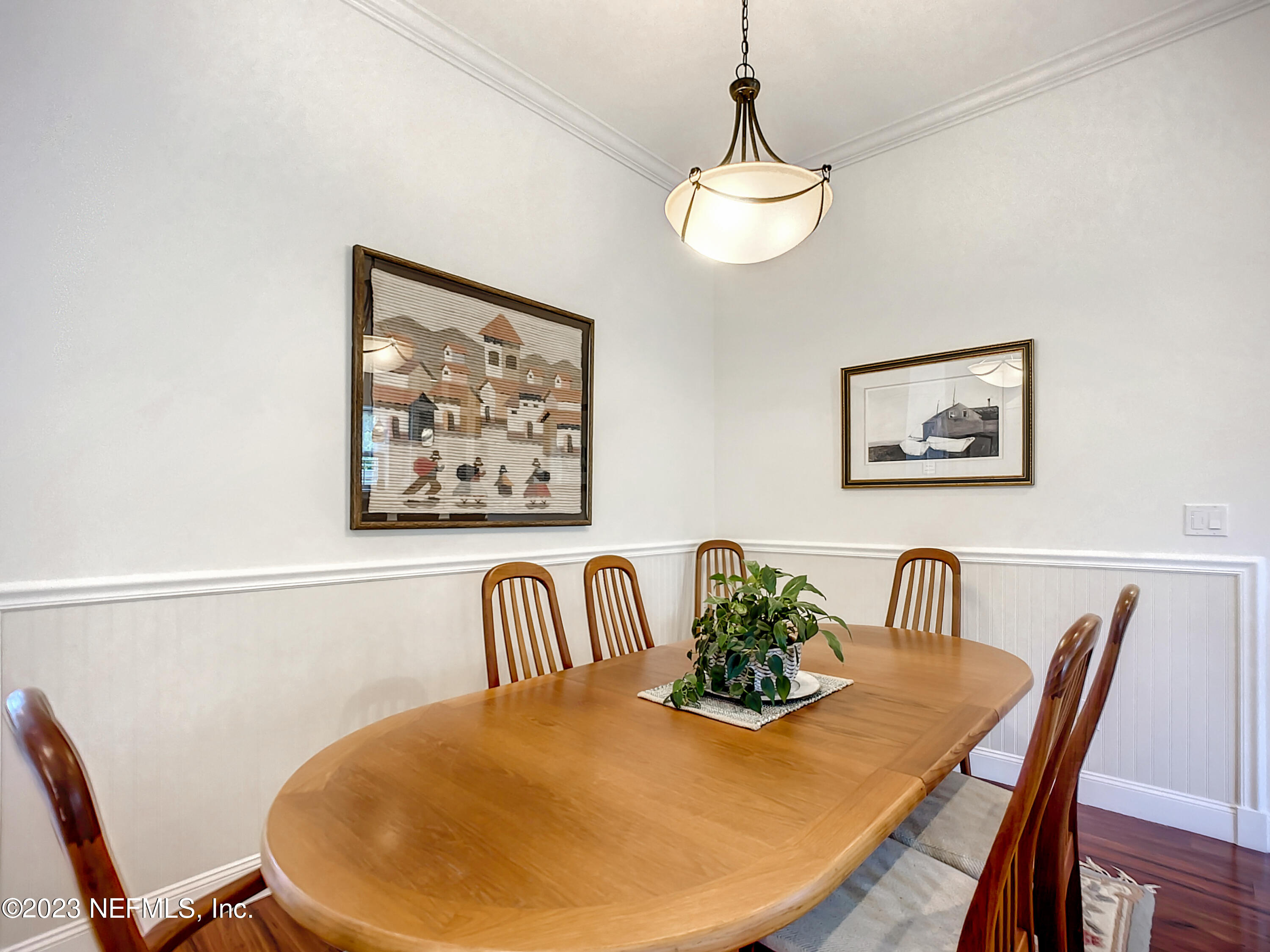 5356 2nd Street St. Augustine, FL 32080 - Photo 8 of 60 a view of a dining room with furniture window and wooden floor