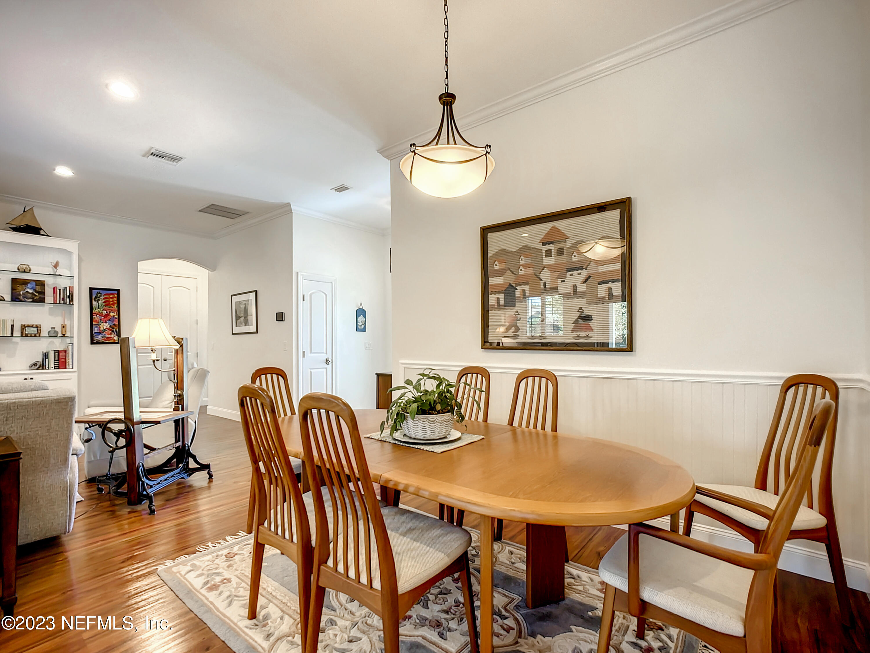 5356 2nd Street St. Augustine, FL 32080 - Photo 10 of 60 a view of a dining room with furniture and wooden floor