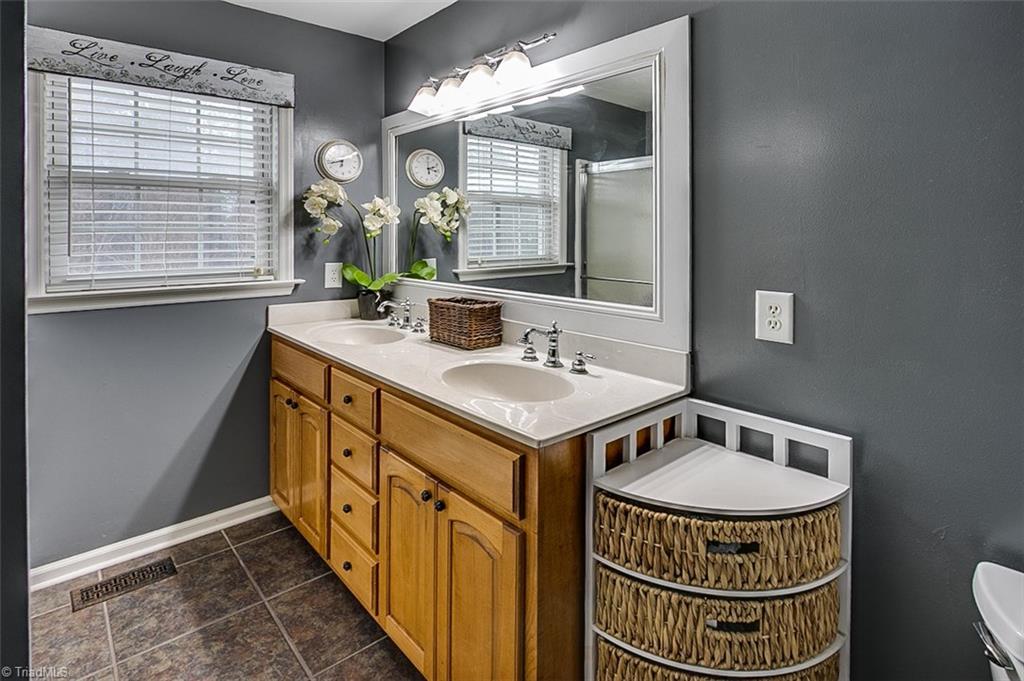 306 Charlie S Road Robbins, NC 27325 - Photo 14 of 30 Master bath, ceramic tile floor & double vanity