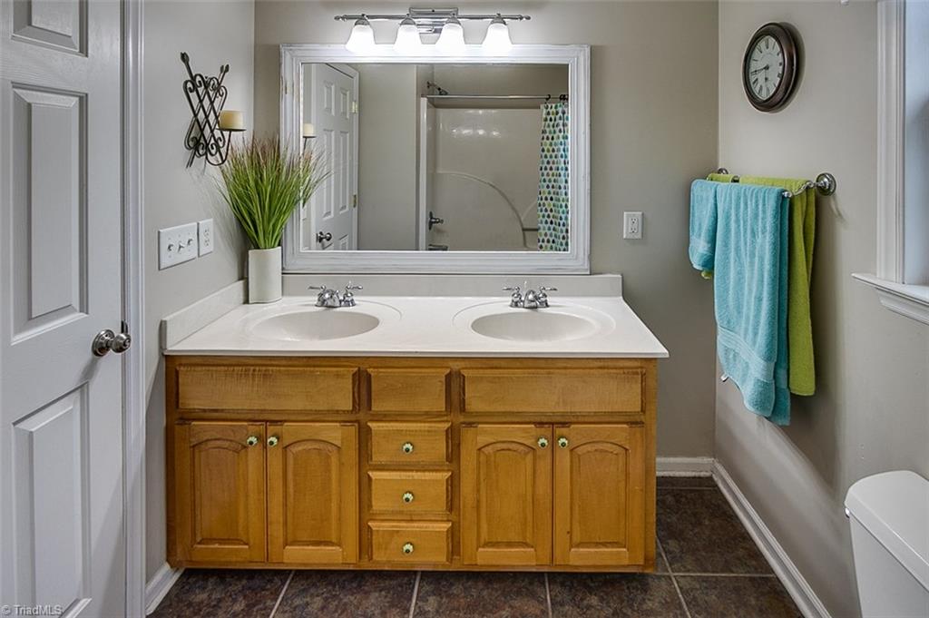 306 Charlie S Road Robbins, NC 27325 - Photo 17 of 30 Hall Bath, ceramic tile floor & double vanity