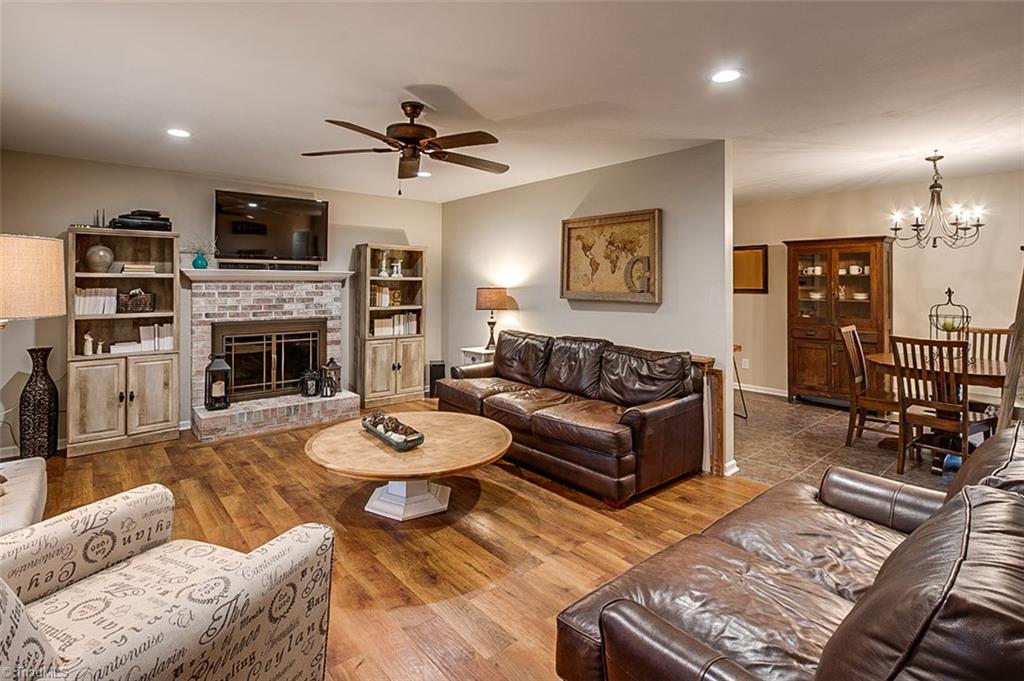 Great Room, LVT floors, wood burning fireplace 