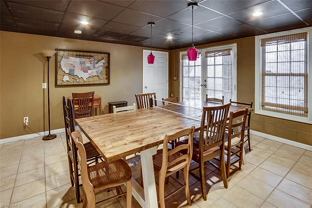 306 Charlie S Road Robbins, NC 27325 - Photo 21 of 30 Bonus room in basement, ceramic tile floor