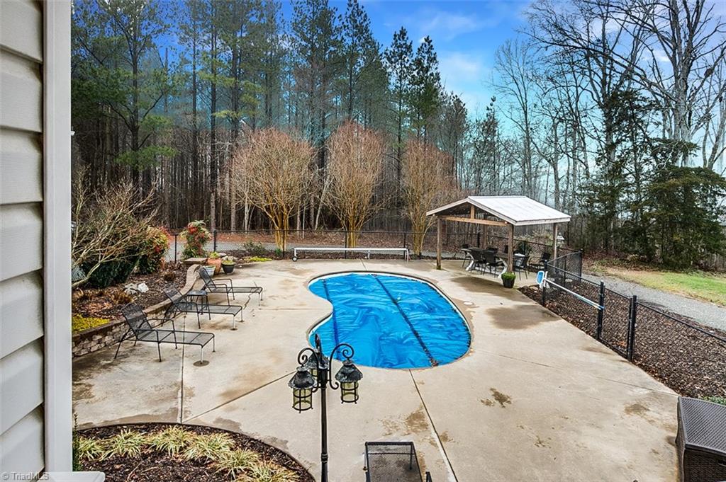 306 Charlie S Road Robbins, NC 27325 - Photo 26 of 30 In-ground saltwater pool with cover