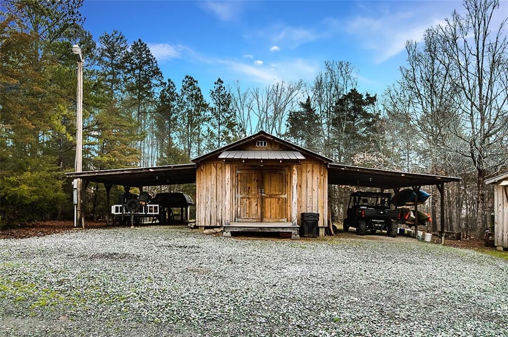 306 Charlie S Road Robbins, NC 27325 - Photo 28 of 30 24 x 16 workshop with 2 attached sheds