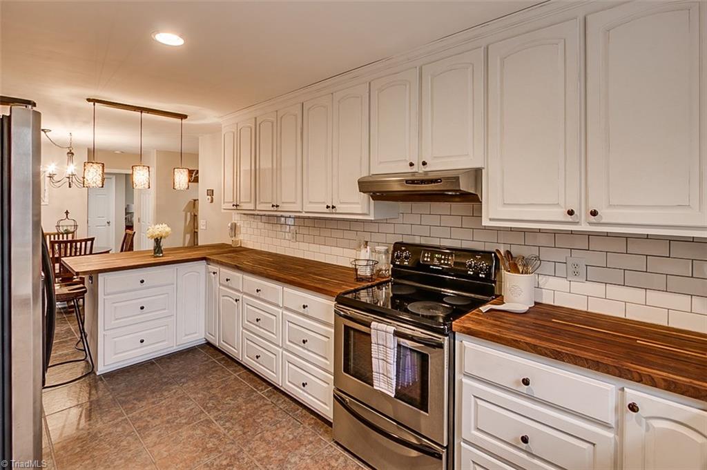 306 Charlie S Road Robbins, NC 27325 - Photo 8 of 30 Kitchen, ceramic tile floor & butcher block counters