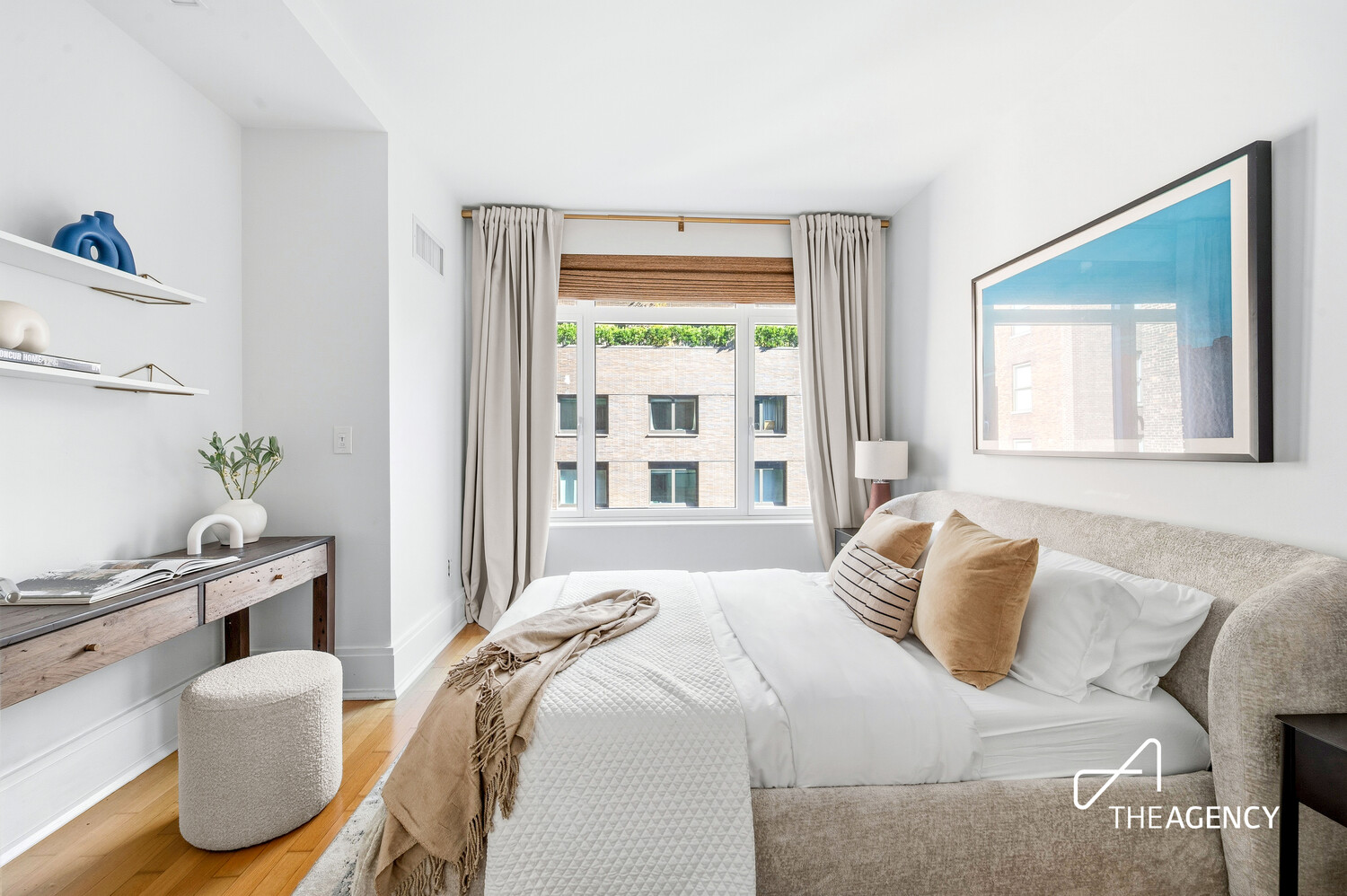 205 West 76th Street, Unit 1202 Manhattan, NY 10023 - Photo 8 of 11 a bedroom with a bed and wooden floor