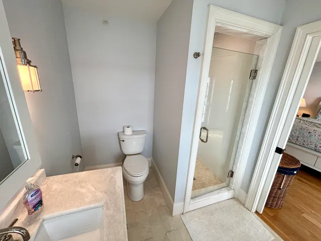 a bathroom with a shower and a tub