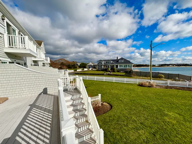 a view of a swimming pool with an ocean view