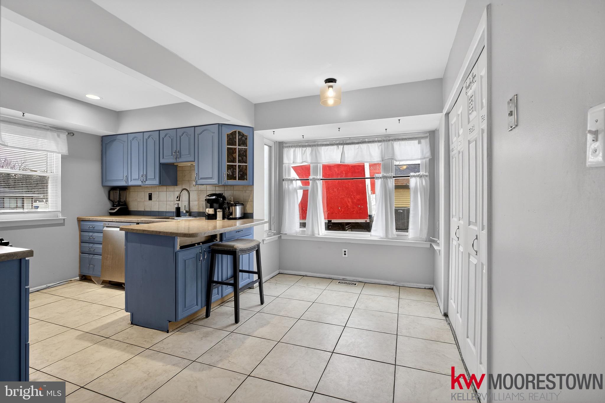 19 Nottingham Way Eastampton, NJ 08060 - Photo 12 of 44 a kitchen with stainless steel appliances granite countertop a refrigerator and a stove top oven