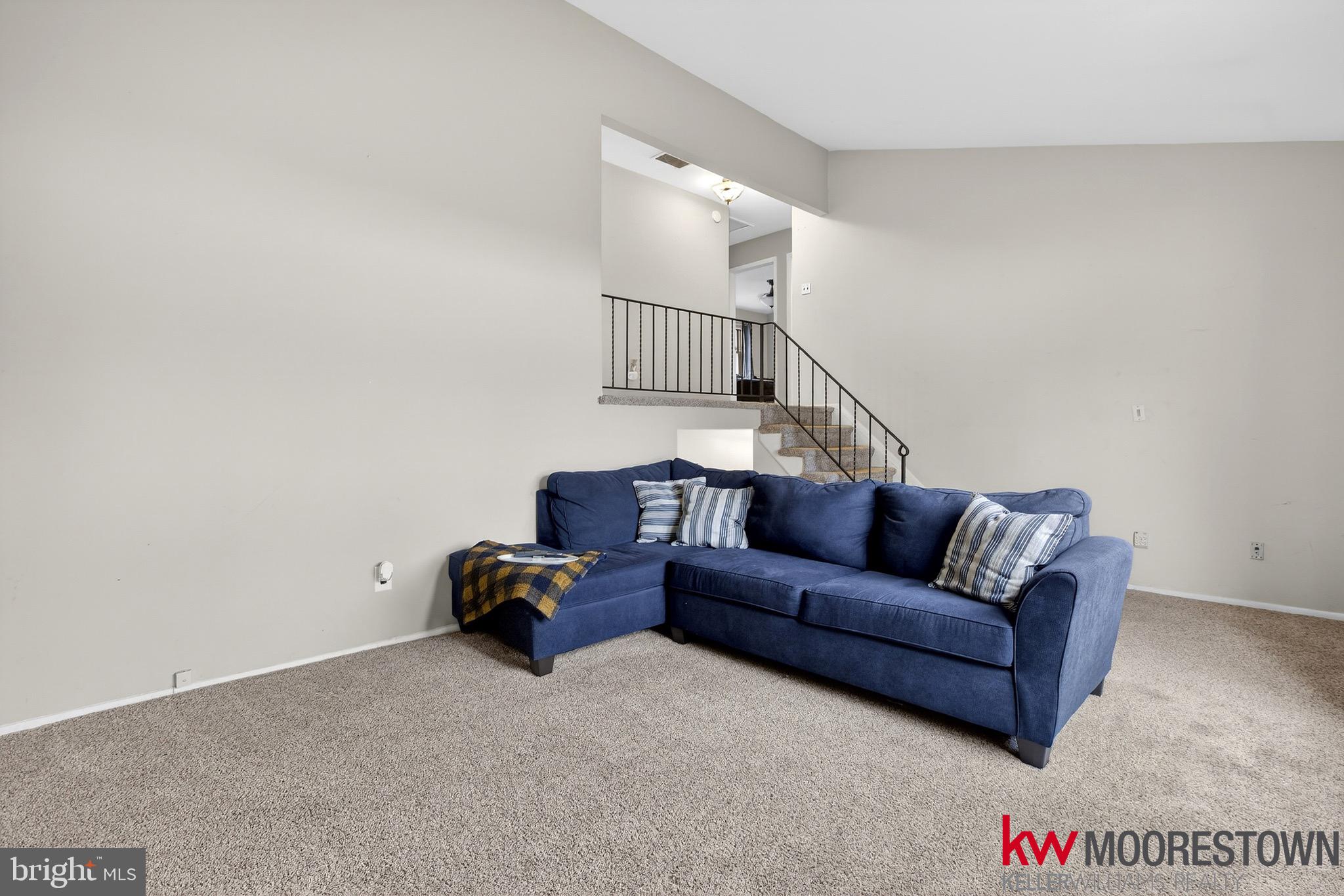 19 Nottingham Way Eastampton, NJ 08060 - Photo 20 of 44 a living room with a couch