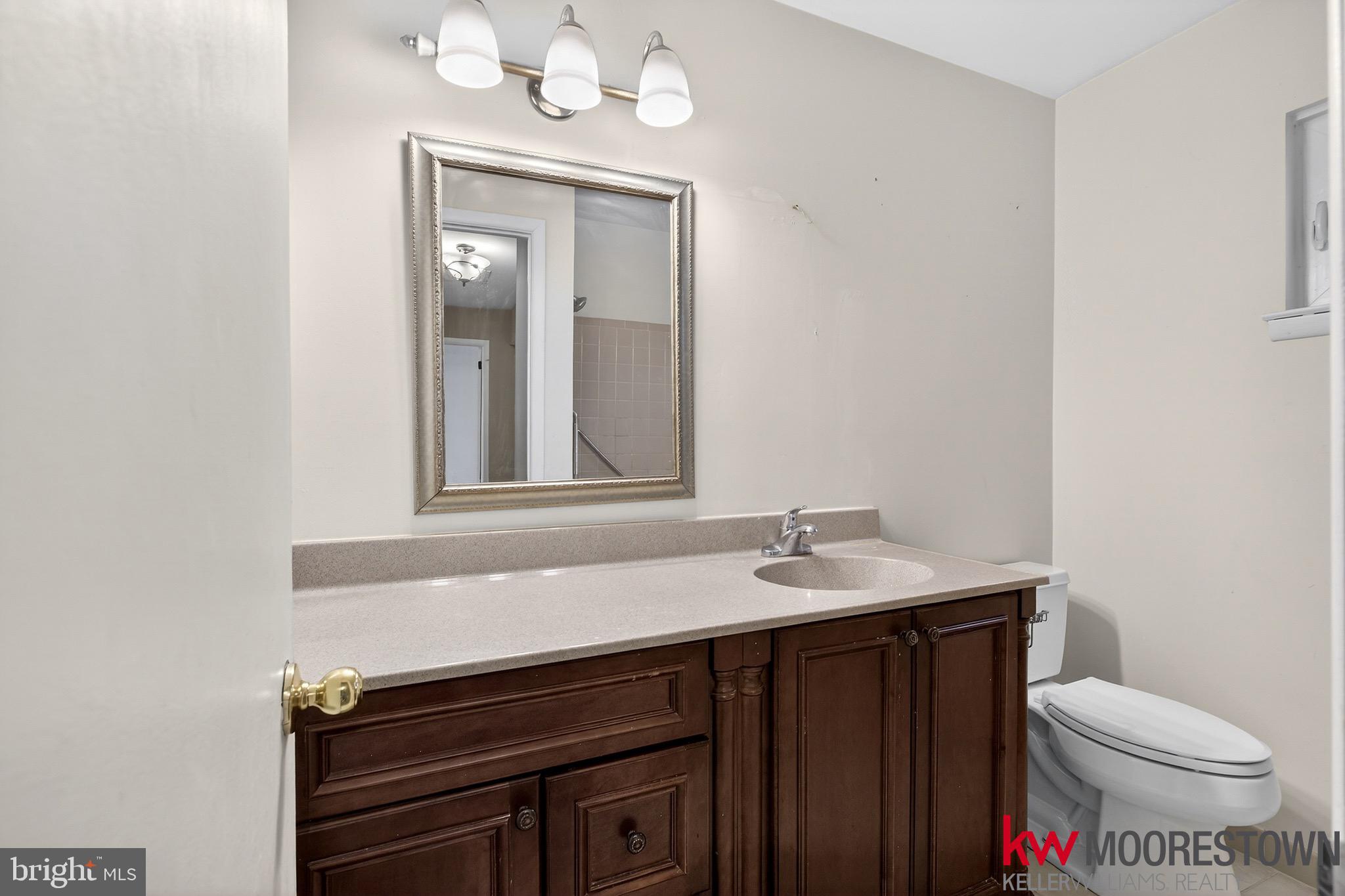19 Nottingham Way Eastampton, NJ 08060 - Photo 24 of 44 a bathroom with a sink vanity and toilet