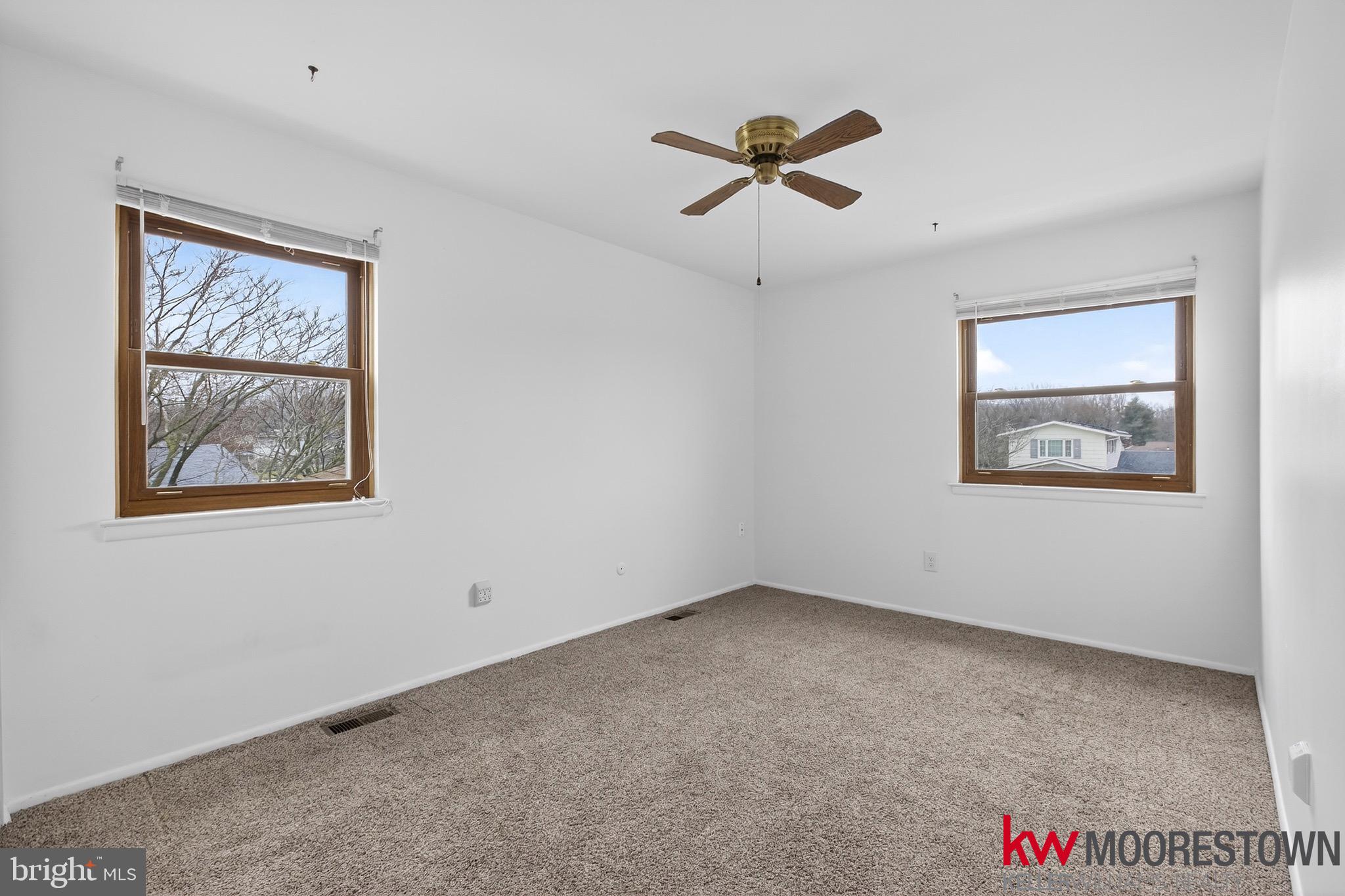 19 Nottingham Way Eastampton, NJ 08060 - Photo 26 of 44 a view of an empty room with a window