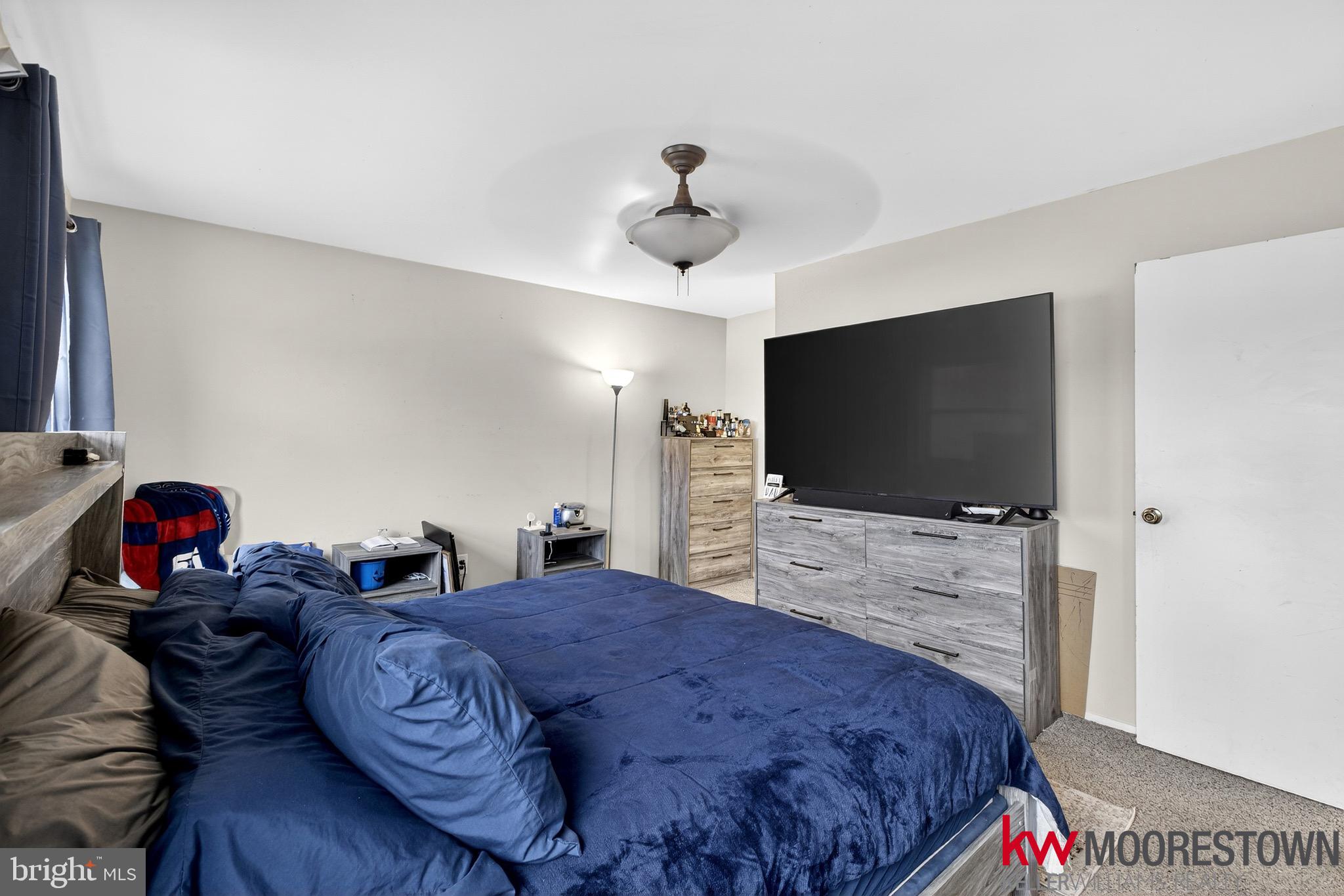 19 Nottingham Way Eastampton, NJ 08060 - Photo 28 of 44 a living room with furniture and a flat screen tv